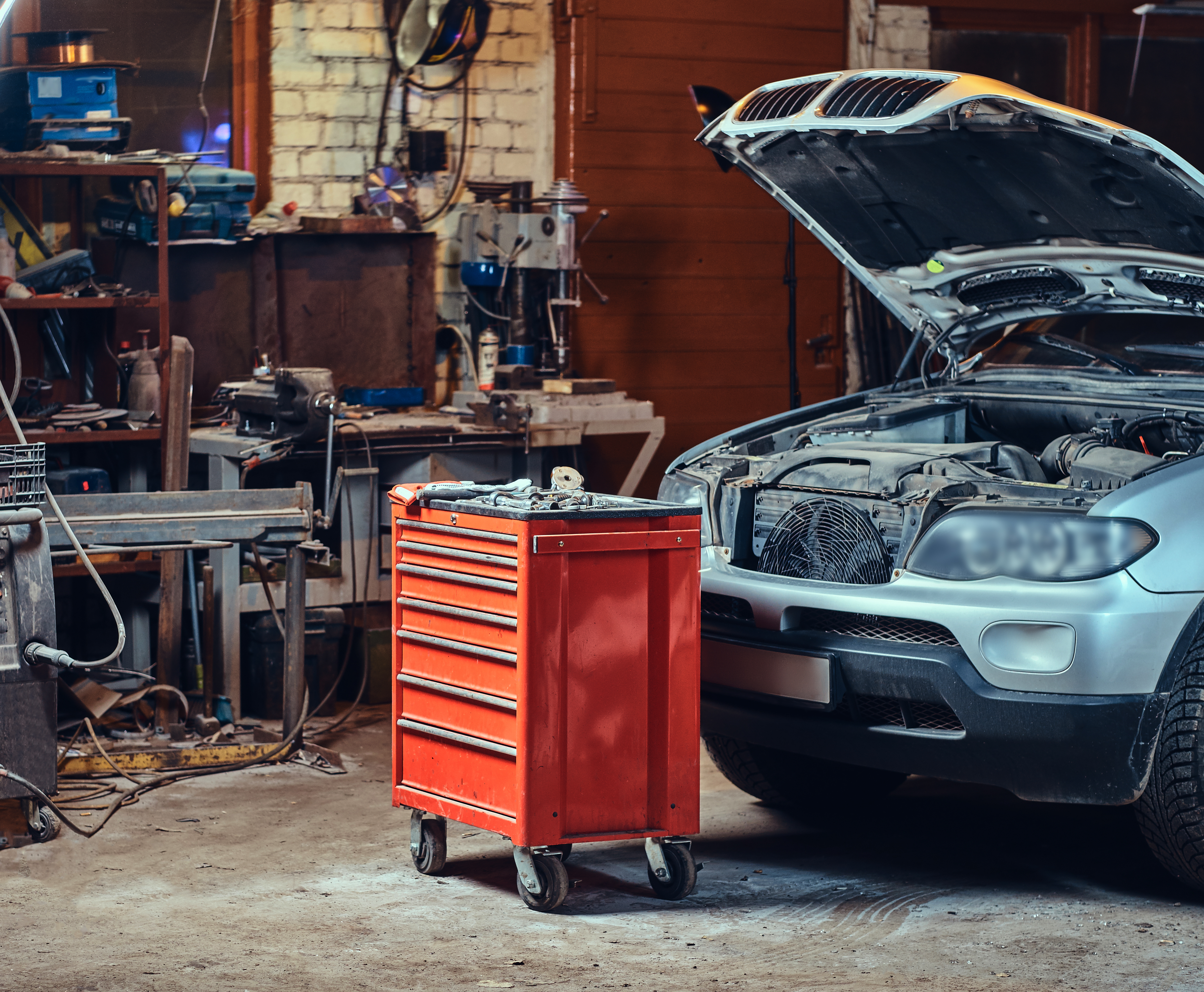 Red tool box in a garage.